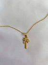 Gold necklace as a  palm tree with stones